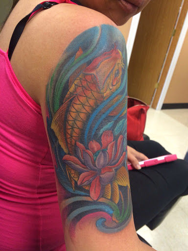 Explore butterfly flower tattoo ideas, creative tattoo ideas in Fargo, available at Golden Dragon Tattoo