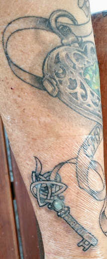 Explore november birth flower tattoo ideas, creative tattoo ideas in Omaha, available at Black Squirrel Omaha