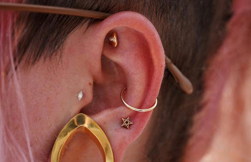 Explore hand tattoo ideas for woman, creative tattoo ideas in Roanoke, available at Sati Piercing & Fine Jewelry