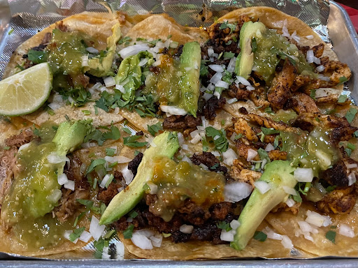 All dressed up with extra Onions and Cilantro and green salsa. 