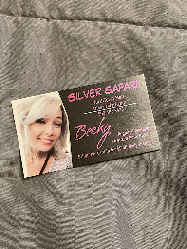 Explore haunted house tattoo ideas, creative tattoo ideas in Spokane, available at Silver Safari NorthTown Mall