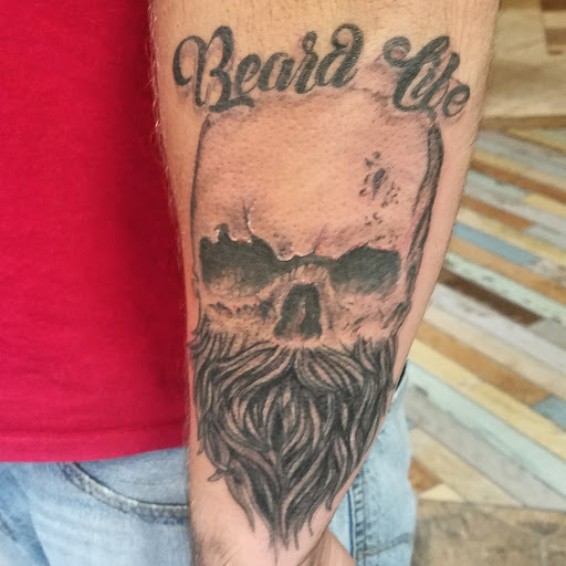 Tattoo Shop «Shameless Tattoos and Piercings», reviews and photos, 115 E Burlington Ave, Fairfield, IA 52556, USA