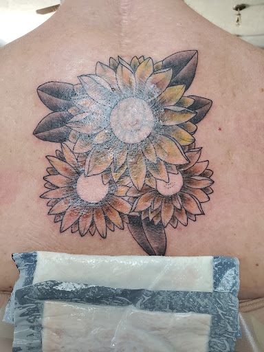 Explore snake tattoo ideas for men, creative tattoo ideas in Bainbridge, available at Olde Town Ink