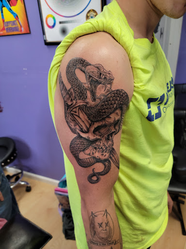 Explore black tattoo ideas for women, creative tattoo ideas in Cambridge, available at Kappa Tattoo