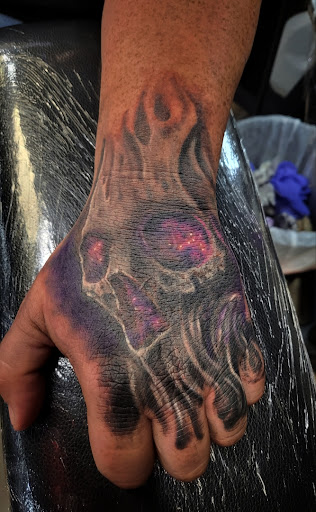 Explore baby tattoo ideas, creative tattoo ideas in Sarasota, available at SEVEN SINS Tattoo Studio