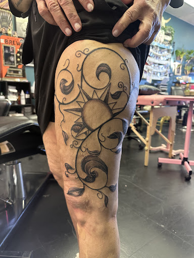 Explore tattoo ideas arms, creative tattoo ideas in Grand Island, available at The Shaded Dahlia Piercing & Tattoo Parlor