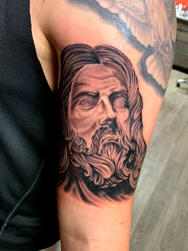 Explore fine line hand tattoo ideas, creative tattoo ideas in Gadsden, available at Old School Ink Electric Tattooing