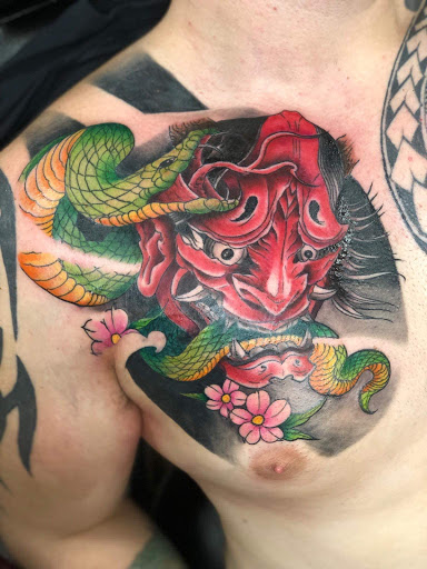 Explore outdoor tattoo ideas, creative tattoo ideas in Huntington, available at Golden Dagger Tattoos and Piercings