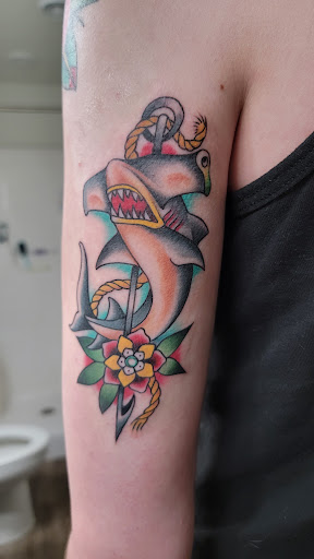 Explore tattoo ideas for mens thigh, creative tattoo ideas in Johnston, available at Obsidian Tattoo