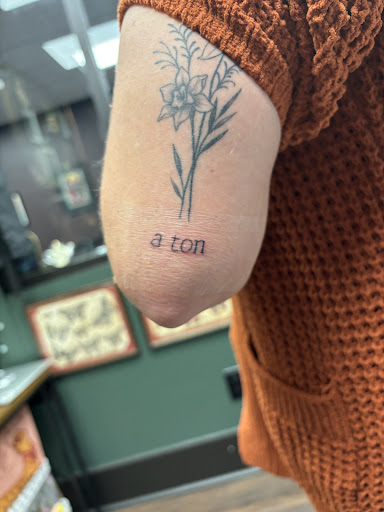 Explore bomb tattoo ideas, creative tattoo ideas in Chicopee, available at Vellum Art Collective Tattoo Studio