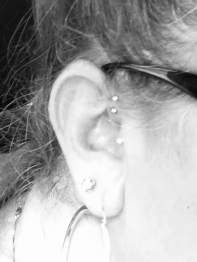 Explore home tattoo ideas, creative tattoo ideas in Bethlehem, available at Studio 33 Piercings by Angi