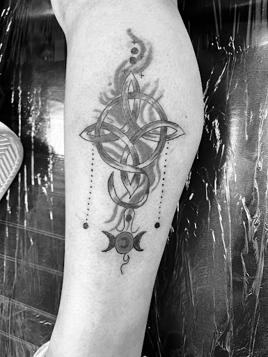 Find cute cat tattoo ideas for your next unique tattoo in Seymour at American Gypsy Tattoo Corp.