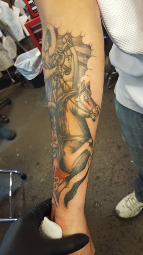 Tattoo Shop «The Mercy Seat», reviews and photos, 210 E 16th St, Kansas City, MO 64108, USA