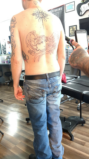 Explore lilac tattoo ideas, creative tattoo ideas in Monroe, available at The Chapel