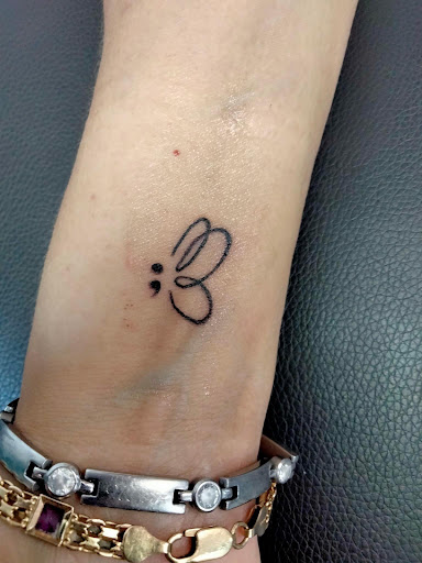 Explore stitch tattoo ideas for ladies, creative tattoo ideas in Lake City, available at Crooked Spines Tattoo Studio