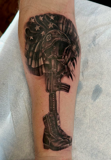 Explore halloween tattoo sleeve ideas, creative tattoo ideas in Le Mars, available at Out of Town Tattoo