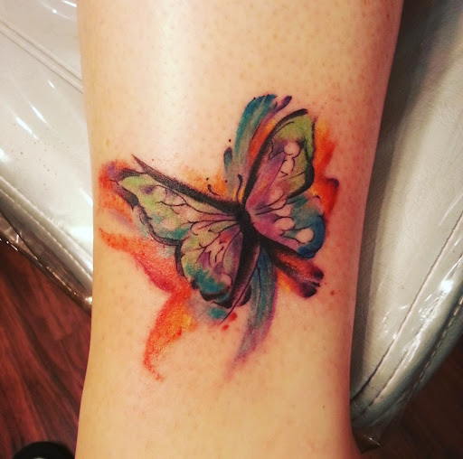 Explore cover up tattoo ideas for leg, creative tattoo ideas in Ambler, available at Tattoo GalaxyAmbler Piercing & Custom Tattoos