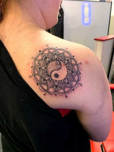 Explore route 66 tattoo ideas, creative tattoo ideas in Charlottesville, available at Mystic Tattoo and Body Piercing