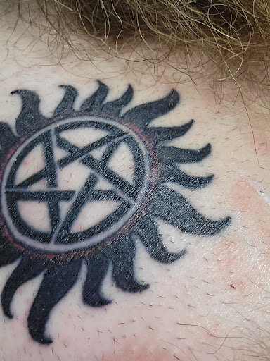 Explore witch broom tattoo ideas, creative tattoo ideas in Kewanee, available at Splat Ink tattoos and piercings