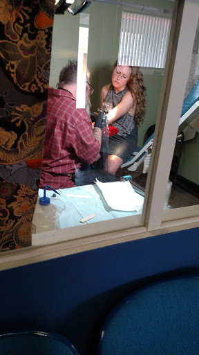 Tattoo Shop «Magnum Tattooing», reviews and photos, 2317 Division Ave S, Grand Rapids, MI 49507, USA