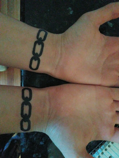 Explore hood neck tattoos ideas, creative tattoo ideas in Franklinton, available at Eternal Ink Tattoo & Body Piercing