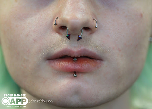 Explore dog bone tattoo ideas, creative tattoo ideas in Fort Myers, available at Tiger Lotus Tattoo and Piercing