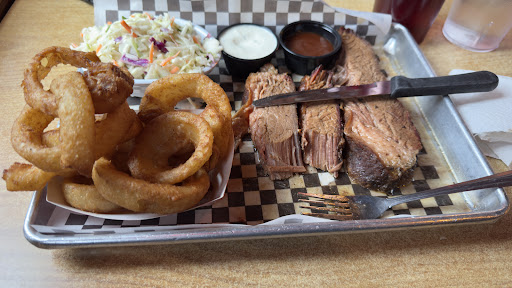 Brisket with onion rings and slaw 