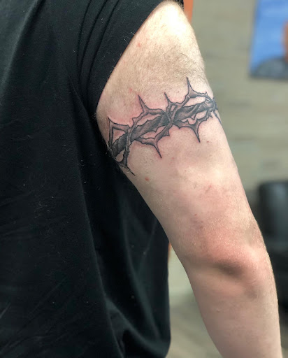 Explore skateboard tattoo ideas, creative tattoo ideas in Rochester, available at Forest Ink Tattoos