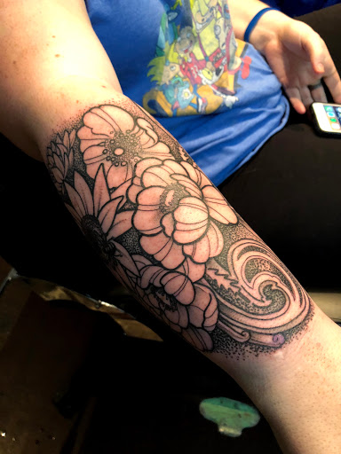 Explore cute spine tattoo ideas, creative tattoo ideas in Kingsford, available at Deft Tattoo Studio