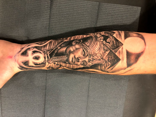 Explore back tattoo cover up ideas, creative tattoo ideas in Sarasota, available at SEVEN SINS Tattoo Studio