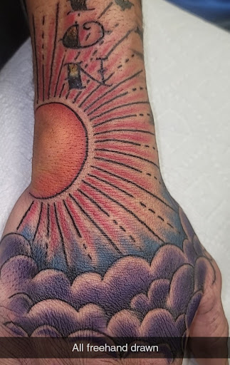 Explore men's dark tattoo ideas, creative tattoo ideas in Lawrenceburg, available at Yellow Rose Tattoo