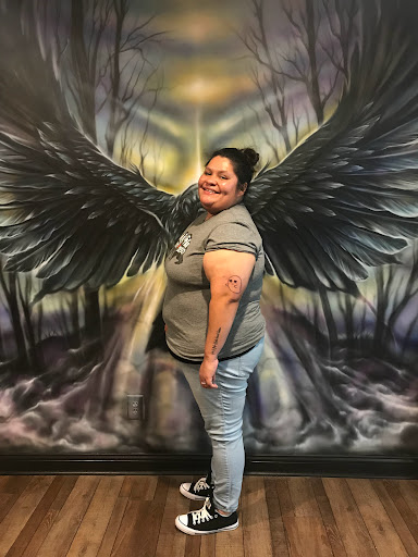 Explore mens angel tattoo ideas, creative tattoo ideas in Clarksville, available at Dark Raine Tattoo