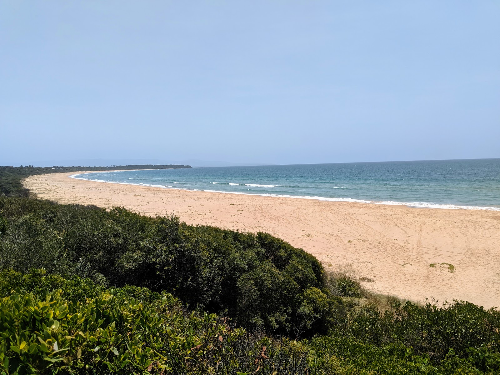 Culburra Beach的照片 带有碧绿色纯水表面