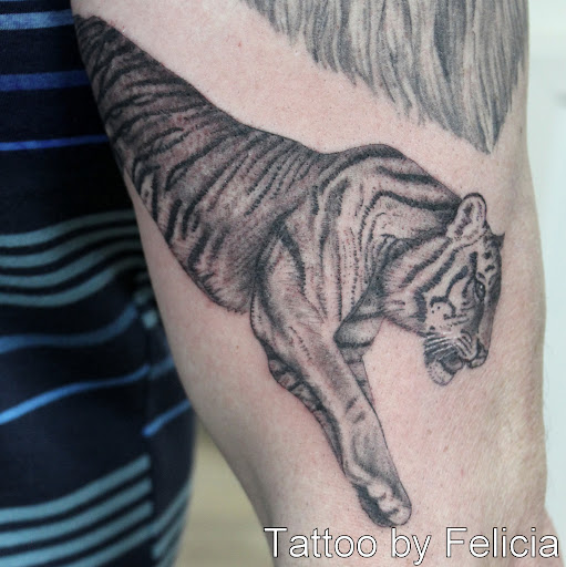 Explore couple tattoos ideas gallery, creative tattoo ideas in Fort Myers, available at Tiger Lotus Tattoo and Piercing