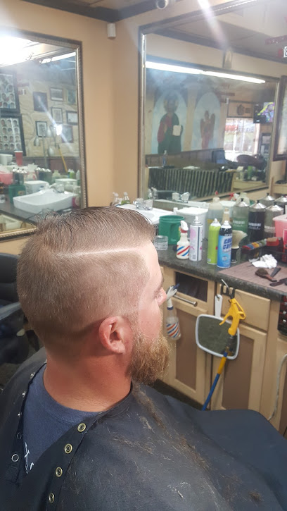Cuts And Fro's Private Barbershop