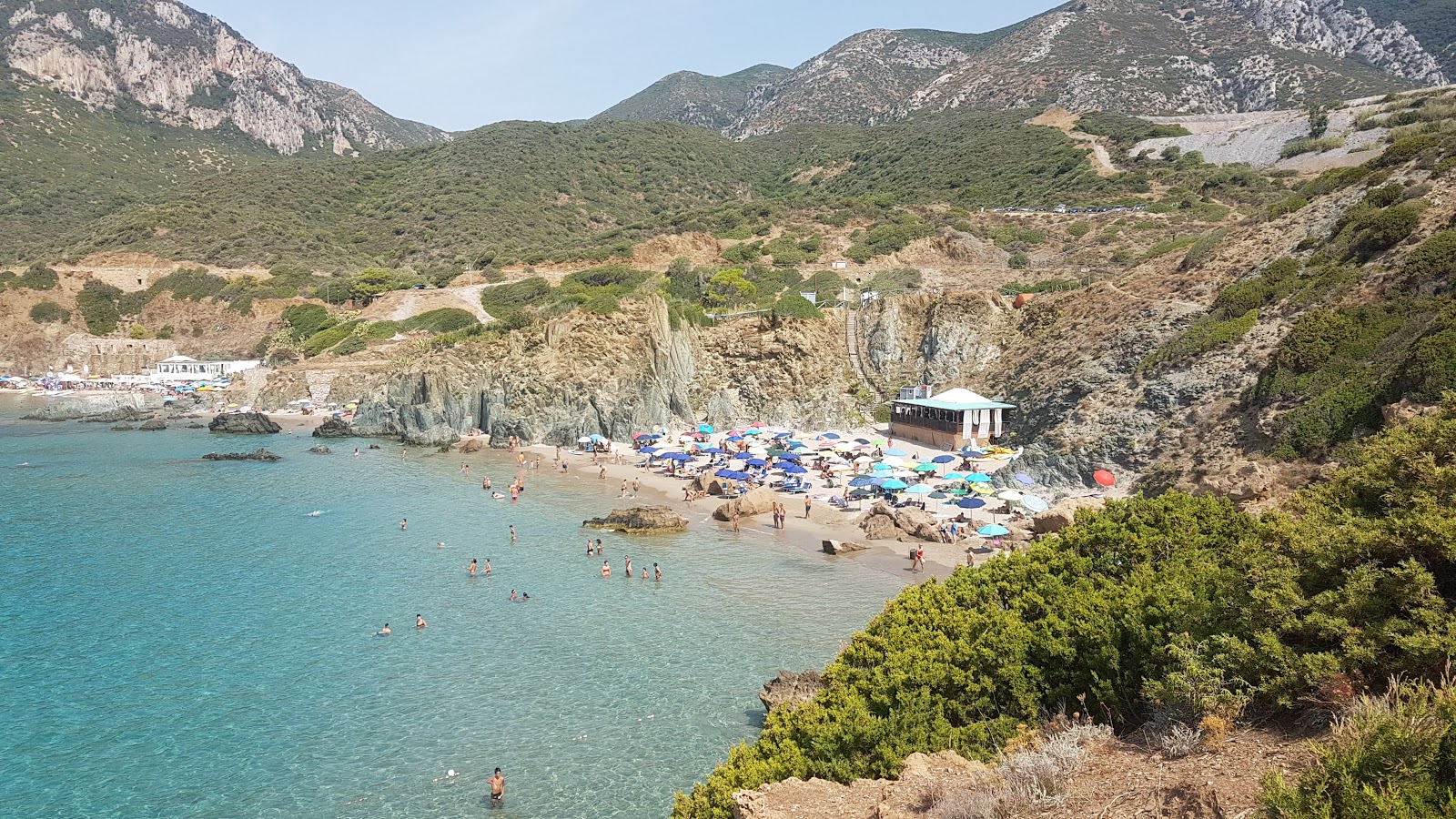 Foto von Porto Cauli Beach mit beiger sand Oberfläche