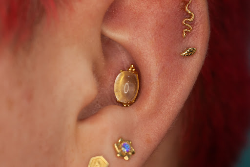 Explore feather memorial tattoo ideas, creative tattoo ideas in Boston, available at Arcadia Body Piercing
