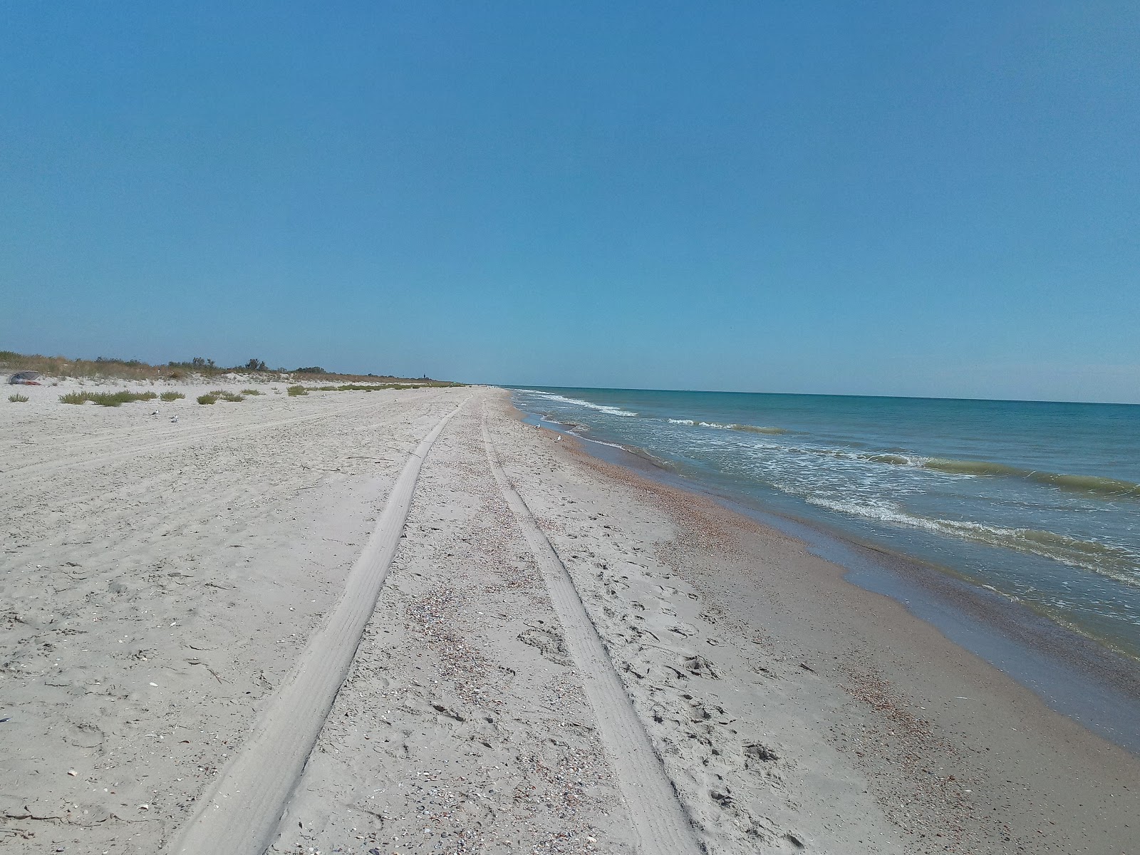 Foto von Plyazh Rasseyka mit beiger sand Oberfläche
