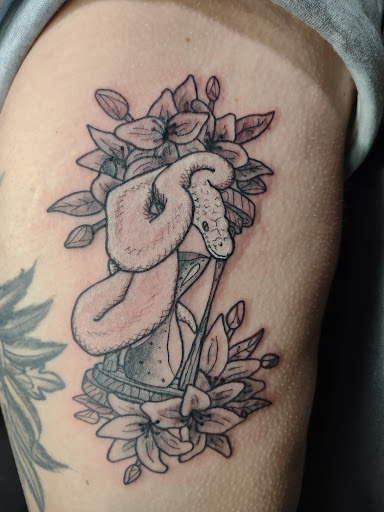 Explore tattoo ideas on forearm for woman, creative tattoo ideas in Williamston, available at Inkd Tattoo Parlor