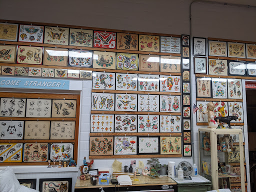 Explore bear tattoo ideas for guys, creative tattoo ideas in Peoria, available at Freedom Ink Tattoos