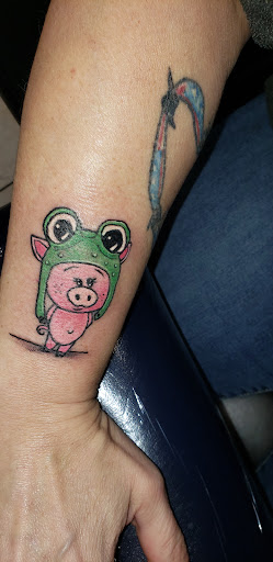 Explore hang loose tattoo ideas, creative tattoo ideas in Englewood, available at Revolution Studios