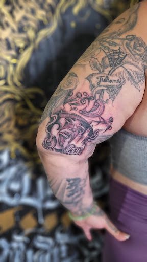 Explore neck tattoo ideas, creative tattoo ideas in Stockton, available at Tatt Me Up Studio