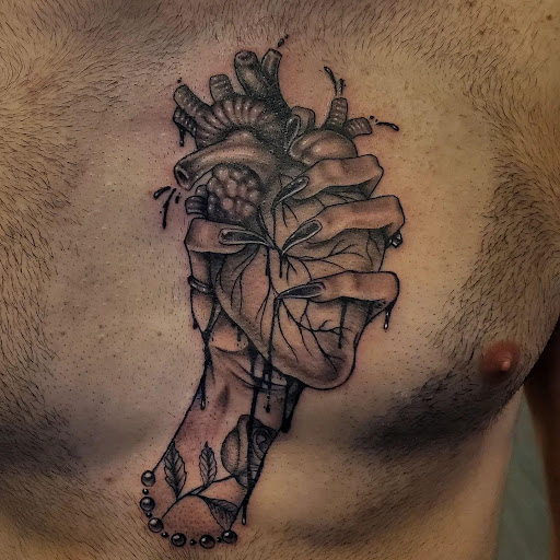 Explore black and grey half sleeve tattoo ideas, creative tattoo ideas in Palm Harbor, available at Angry Owl Tattoo and Piercing