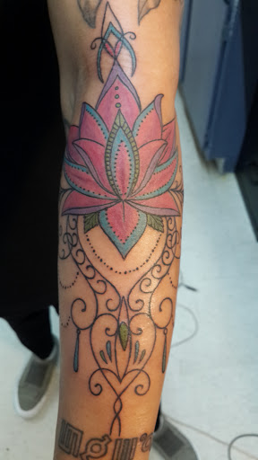 Explore foot tattoo ideas male, creative tattoo ideas in San Angelo, available at Alchemy Tattoo and Piercing Studio