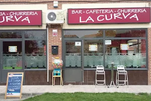 Bar-Churreria La curva image