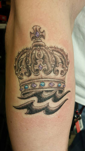 Explore leo tattoo ideas for men, creative tattoo ideas in Pelham, available at Tattoo Fever