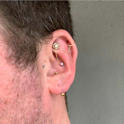 Explore chin tattoo ideas, creative tattoo ideas in Charleston, available at Exotic Impressions Body Piercing