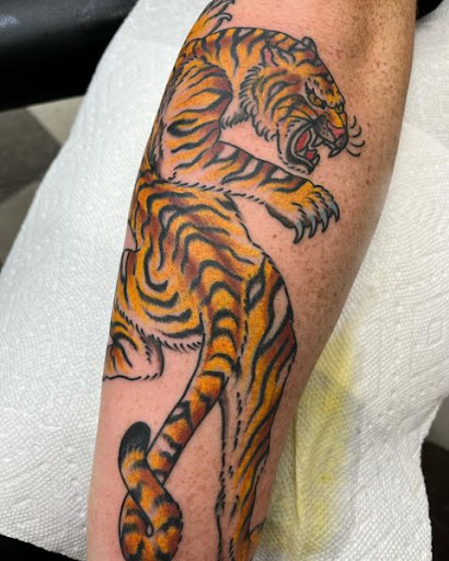 Explore flower foot tattoo ideas, creative tattoo ideas in Virginia Beach, available at Salt Water Tattoo