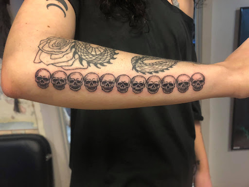 Explore red string of fate tattoo ideas, creative tattoo ideas in Jonesboro, available at Immortal Ink