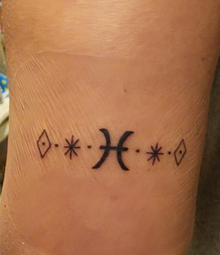 Explore ideas for initial tattoos, creative tattoo ideas in Venice, available at KISS KISS TATTOO & PIERCING